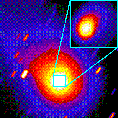 [IMAGE: comet with enlarged inset]